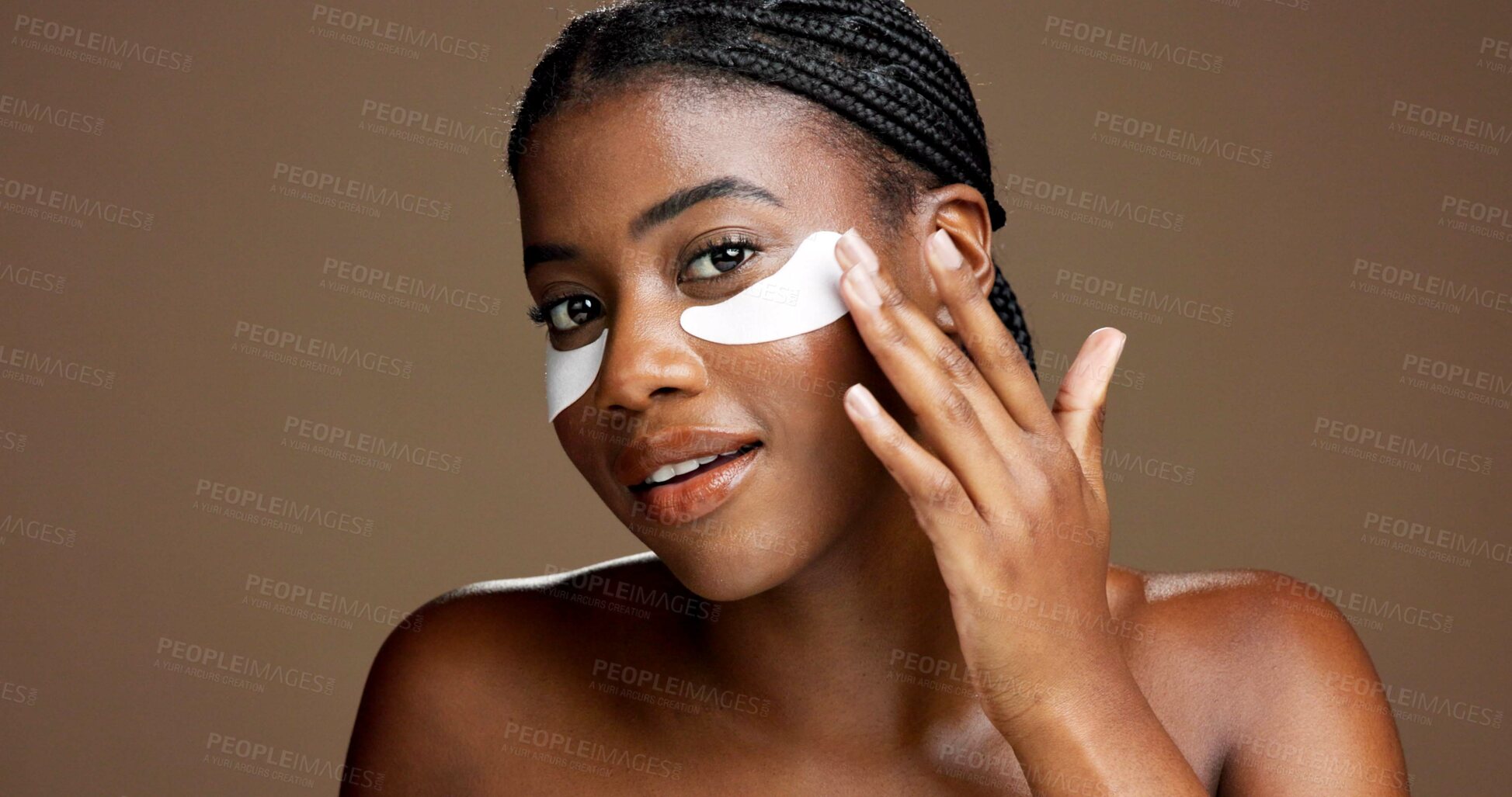 Buy stock photo Black woman, portrait and eye mask for skincare in studio, dermatology or reduce puffiness on background. Beauty, skin health or hydration with hyaluronic patches or cosmetic product for dark circles