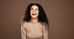 Natural, laugh and portrait of woman in studio for beauty, curly hairstyle and healthy texture. Hair care, mockup space and person with shine for treatment, growth and cosmetics on brown background