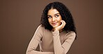Thinking, makeup and woman in studio with ideas for cosmetic, natural or facial glow routine. Happy, brainstorming and female person with beauty, glamour or cosmetology treatment by brown background.