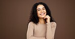 Beauty, smile and hands with portrait of woman in studio for natural makeup, glow and self care. Happiness, shine and aesthetic with person on brown background space for dermatology and hydration