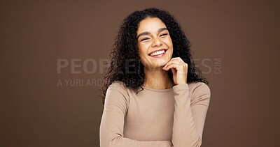 Buy stock photo Beauty, smile and hands with portrait of woman in studio for natural makeup, glow and self care. Happiness, shine and aesthetic with person on brown background space for dermatology and hydration