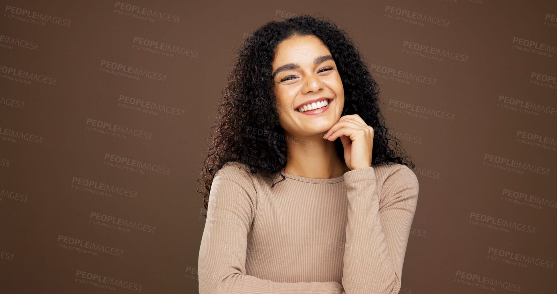 Buy stock photo Beauty, smile and hands with portrait of woman in studio for natural makeup, glow and self care. Happiness, shine and aesthetic with person on brown background space for dermatology and hydration