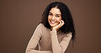 Beauty, glow and hands with portrait of woman in studio for natural makeup, smile and self care. Happiness, shine and aesthetic with person on brown background space for dermatology and hydration