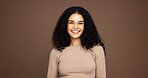 Beauty, shine and portrait of woman in studio for natural makeup, smile and self care. Happiness, glow and aesthetic with female person on brown background space for dermatology and hydration