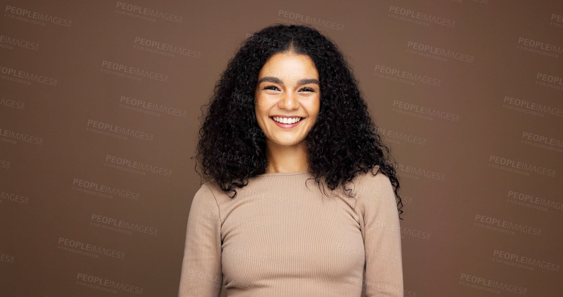 Buy stock photo Beauty, shine and portrait of woman in studio for natural makeup, smile and self care. Happiness, glow and aesthetic with female person on brown background space for dermatology and hydration