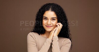 Buy stock photo Makeup, portrait and happy woman in studio for cosmetics, beauty or facial glow with glamour. Smile, natural and female person from Colombia with face cosmetology for confidence by brown background.