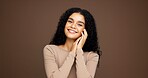 Cosmetics, portrait and woman in studio for beauty, makeup or facial glow with glamour. Smile, natural and female person from Colombia with face cosmetology for confidence by brown background.