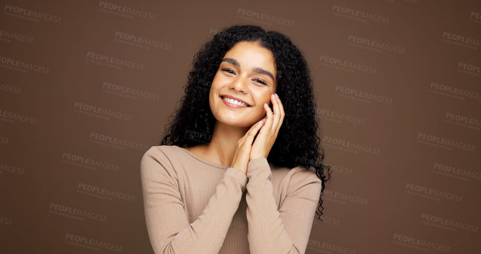 Buy stock photo Cosmetics, portrait and woman in studio for beauty, makeup or positive for facial glow. Smile, natural and female person from Colombia with face cosmetology for confidence by brown background.