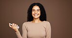 Portrait, smile and woman with spray, studio background or pride for fresh scent, beauty or product. Mockup space, person or confident with cosmetic for smell, perfume or getting ready with fragrance