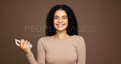Buy stock photo Portrait, smile and woman with spray, studio background or pride for fresh scent, beauty or product. Mockup space, person or confident with cosmetic for smell, perfume or getting ready with fragrance