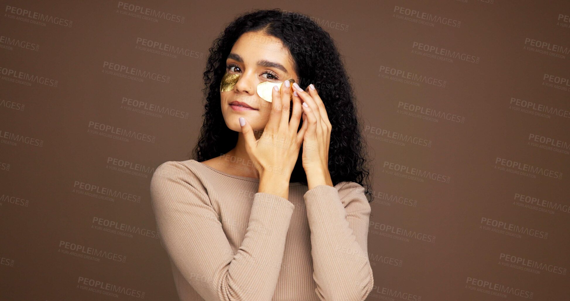 Buy stock photo Portrait, woman and eye patches for skincare, detox and hydration on brown studio background. Face, cosmetics and model with gel mask for beauty, dermatology or facial application with mockup space