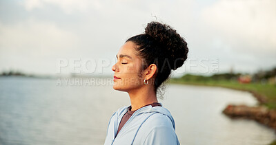 Buy stock photo Breathing, fitness and meditation with woman at lake in nature for awareness, balance or wellness. Exercise, eyes closed and zen with calm person outdoor in park for inner peace or mindfulness