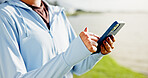 Woman, hands and fitness with phone at lake for social media, workout routine or tracking app. Closeup, female person or browsing with mobile smartphone for physical activity or health tips at river