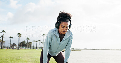 Buy stock photo Headphones, tired woman or runner in lake with space for training, workout and exercise. Exhausted, resting or sports athlete sweating on break for streaming music audio, challenge or fitness podcast