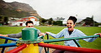 Couple, happy and spinning on roundabout at playground for workout break, adrenaline and freedom. Fitness, excited and people with laugh on carousel at park for playing together or rest from exercise