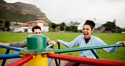 Buy stock photo Couple, happy and spinning on roundabout at playground for workout break, adrenaline and freedom. Fitness, excited and people with laugh on carousel at park for playing together or rest from exercise