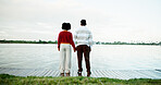 Back view, lake and couple holding hands on vacation, holiday and travel with space in nature. Pier, man and woman sightseeing together by water for love, support and bonding with connection on trip