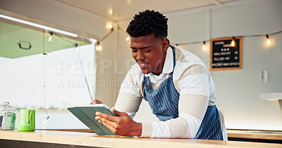 Buy stock photo Black man, owner and tablet at food truck outdoor for online order, inventory update and event planning. Smile, male person and digital with price list, menu checklist and startup vendor application