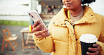 Woman, hands and phone with coffee for social media, post or review at outdoor barista stand. Female person, user or rate with mobile smartphone for subscription or customer service at local cafe