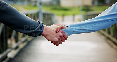 Buy stock photo Fitness, exercise or friends with handshake on bridge for running challenge, cardio success or goals. Athlete, runner teamwork or people with shaking hands outdoor for pace achievement or performance
