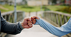 Friends, fitness and fist bump with hands outdoor for greeting, hello or welcome. Sports, people and gesture together for teamwork, support and collaboration with partnership for wellness on bridge