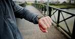 Smart watch, fitness and hands of person in city for health stats, tracking progress and timer. Workout, heart rate and performance monitor with runner on bridge for wellness, challenge and results
