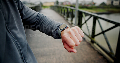 Buy stock photo Smart watch, fitness and hands of person in city for health stats, tracking progress and timer. Workout, heart rate and performance monitor with runner on bridge for wellness, challenge and results