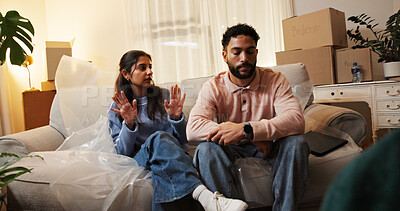 Buy stock photo Frustrated, boxes and couple with fight in home for rental eviction, moving out or lease violation. Night, stress and people with argument on sofa for mortgage crisis, financial issue and foreclosure