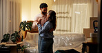 Love, real estate and couple dance in new home to celebrate dream house or property investment. Man, woman and moving to music for relocation goal, mortgage success and romance with partner at night