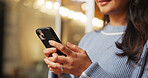 Phone, hands and woman in coffee shop with networking, communication or connectivity in mobile app. Cellphone, texting and female person on blog for restaurant review on website in restaurant.