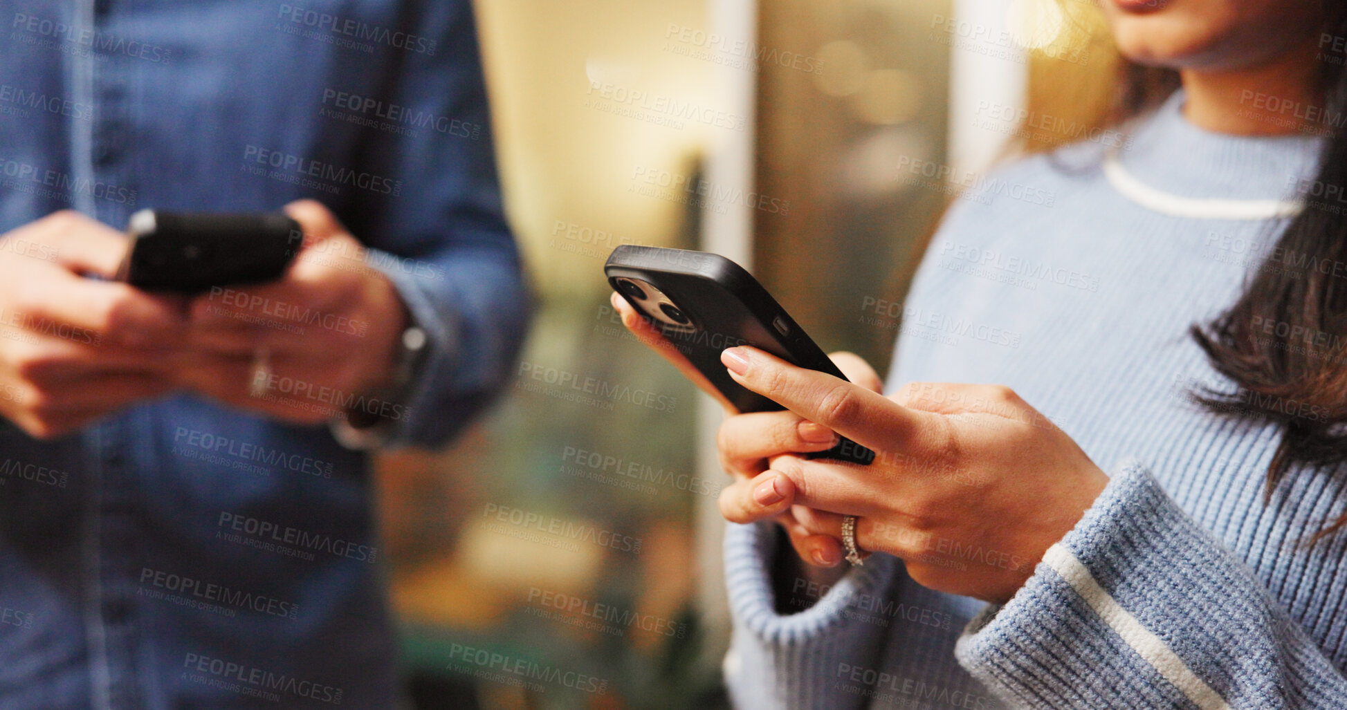 Buy stock photo Phone, networking and hands of couple with texting in coffee shop for contact on mobile app. Technology, communication and man with woman on cellphone for online connectivity together in restaurant.