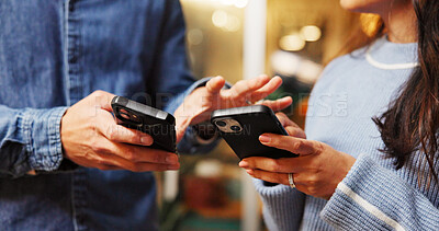 Buy stock photo Cellphone, networking and hands of couple with texting in coffee shop for contact on mobile app. Technology, communication and man with woman on phone for connectivity in cafe, diner or restaurant.