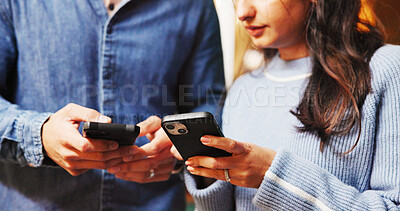 Buy stock photo Phone, communication and hands of couple with texting in coffee shop for contact on mobile app. Technology, networking and people on cellphone for social media, connectivity or notification in cafe.