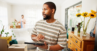Buy stock photo Thinking, tablet and moving with black man in new home for relocation, furniture inventory and real estate. Boxes checklist, property investment and reflection with couple in living room for planning