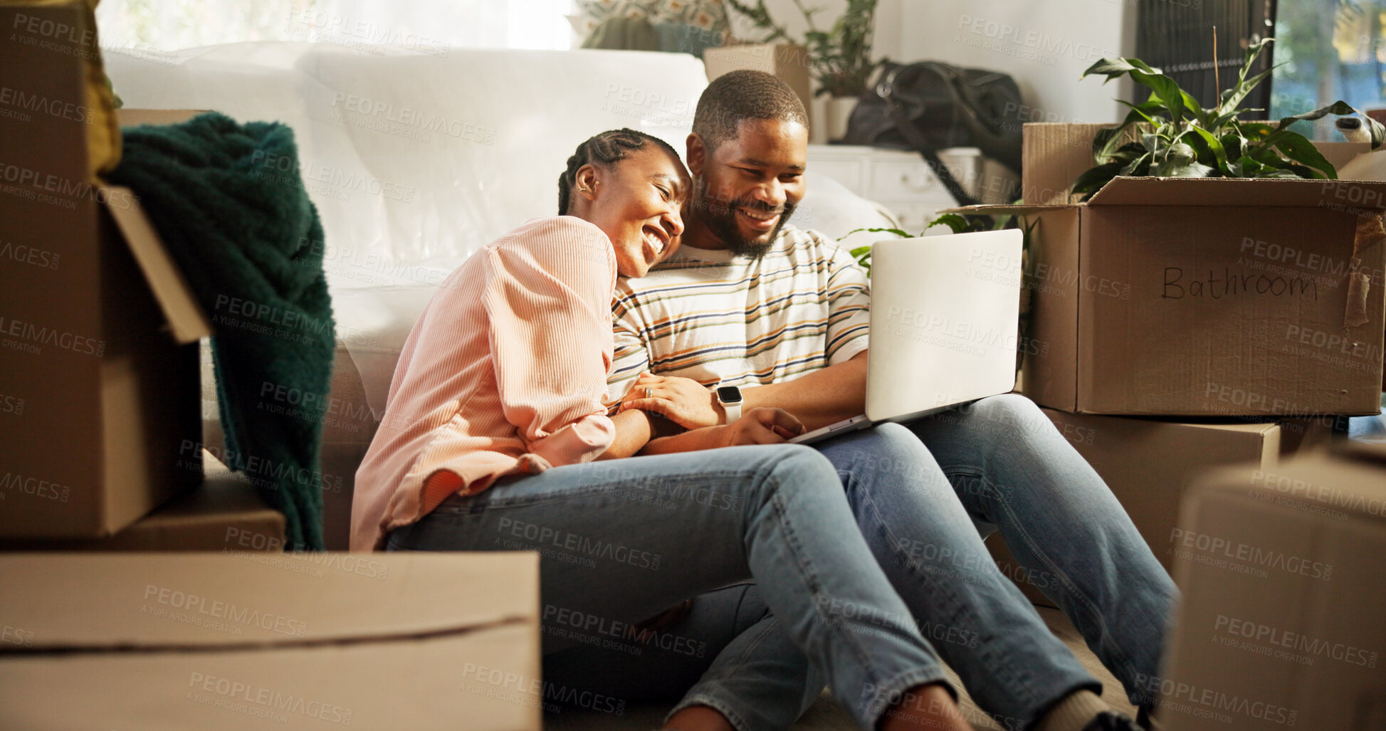 Buy stock photo Happy, couple and browsing on laptop in new home, research or planning for renovation or discussion. Bonding, black woman and man with tech for online shopping, relocation and furniture on website