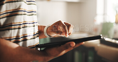 Buy stock photo Tablet, hands and person scroll app in kitchen for renovation, online shopping and remodeling. Technology, home and man on website for communication, search and purchase painting supplies for upgrade