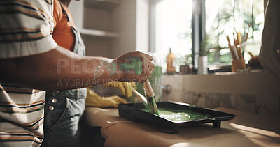 Buy stock photo DIY, hand and painting with person in kitchen of apartment for home improvement or renovation. Maintenance, paintbrush and restoration with homeowner couple in new house for real estate investment