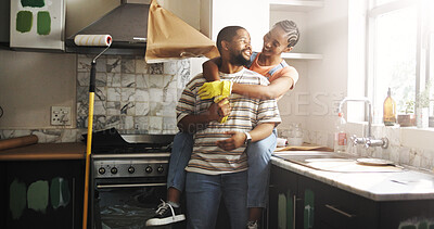 Buy stock photo Hug, love and black couple in kitchen in home for painting, renovation or maintenance together. Happy, connection and African woman embracing man for bonding with diy decoration in apartment.