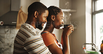 Buy stock photo Home renovation, love and couple with coffee, hug or romance on break in kitchen, paint and morning. Happy, black man and woman with caffeine, bonding or remodeling of new house, color or maintenance