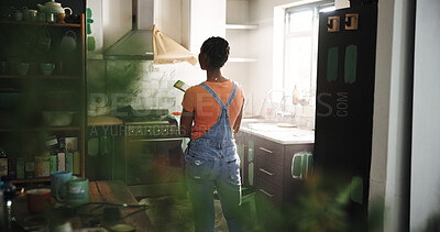 Buy stock photo DIY, painting and thinking with black woman in kitchen of new house for maintenance from back. Paintbrush, real estate and restoration with homeowner person in apartment for development or renovation
