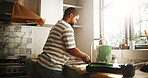 Washing, hands and man in kitchen, remodeling and paint removal with water in new house and hygiene. Painter, black person and cleaning color with liquid for disinfection, sink and home renovation