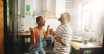 Excited, couple and achievement for home improvement, paint or remodeling of kitchen or celebration. Happy, black man and woman with diy project, success and color for house, renovation and makeover