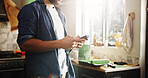 DIY, hands and phone with man in kitchen of apartment to search for home improvement ideas. App, maintenance and renovation with homeowner in new house for interior design, online planning or texting