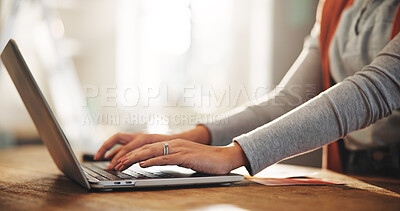 Buy stock photo Hands, laptop and typing with person in home office for planning, remote work or research. Computer, small business and startup with freelance employee at desk in study of apartment for report