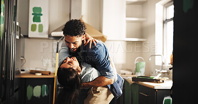 Buy stock photo Dance, painting and love with couple in kitchen for renovation, bonding and support. Remodeling, DIY project and romance with man and woman in apartment for home improvement, partner and music