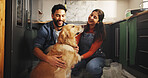 Painting, dog and smile with couple in kitchen for bonding, remodeling and animal care. Happiness, renovation and petting golden retriever with man and woman for home improvement and diy project