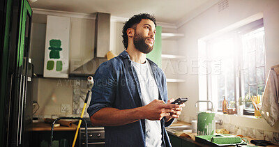 Buy stock photo DIY, phone and thinking with man in kitchen of apartment to search for home improvement ideas. App, maintenance and renovation with homeowner in new house for interior design or online planning
