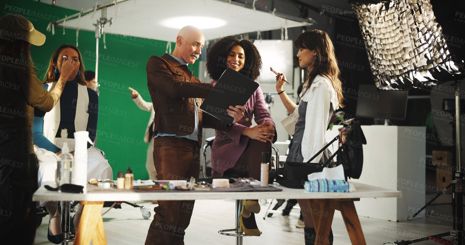 Buy stock photo People, actress and filming with clipboard in studio for scene notes, feedback and director advice. Team, makeup and prepare with supervisor for movie production, performance guide and script lines