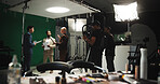 People, filming and stabilize with, journalist in studio of broadcast, production process and record. Team, actor lines and cameraman on set for shooting news, documentary footage and scene rehearsal