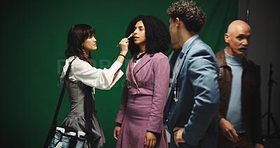 Buy stock photo Set, women and makeup artist with brush, makeover and application of cosmetics, creative and beauty. Behind the scene, people and getting ready for photoshoot, preparation and crew with equipment